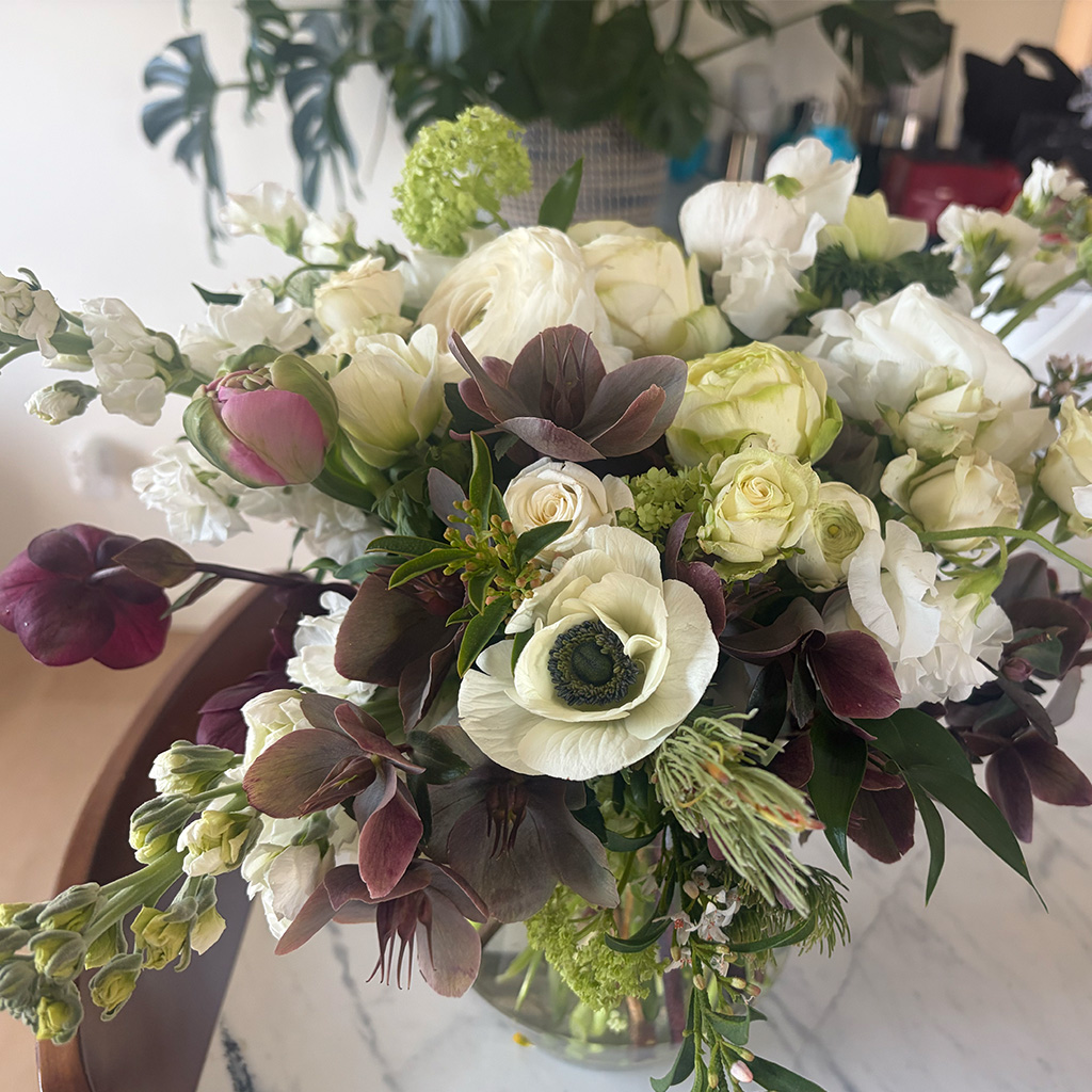 Moody, sculptural arrangement with depth by Wild Beauty Floral Design
