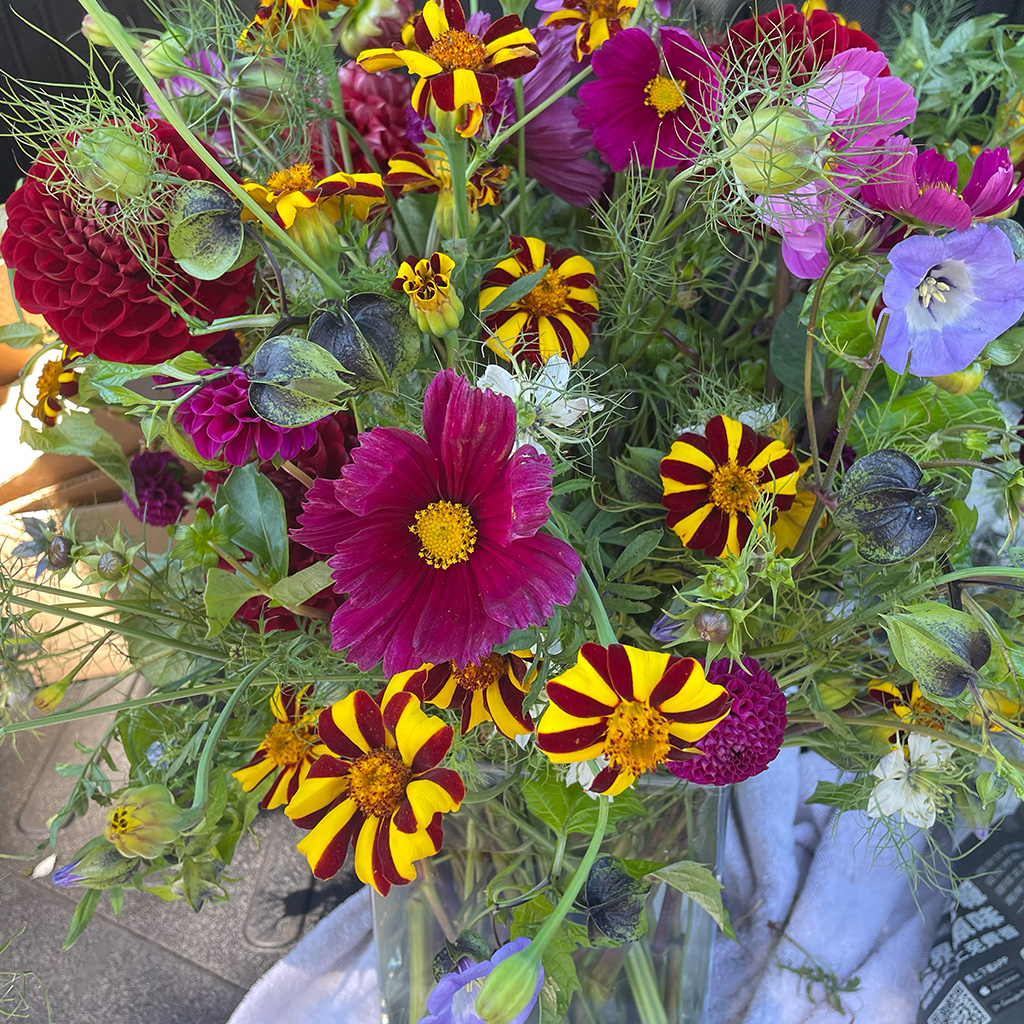 Moody, sculptural arrangement with depth by Wild Beauty Floral Design