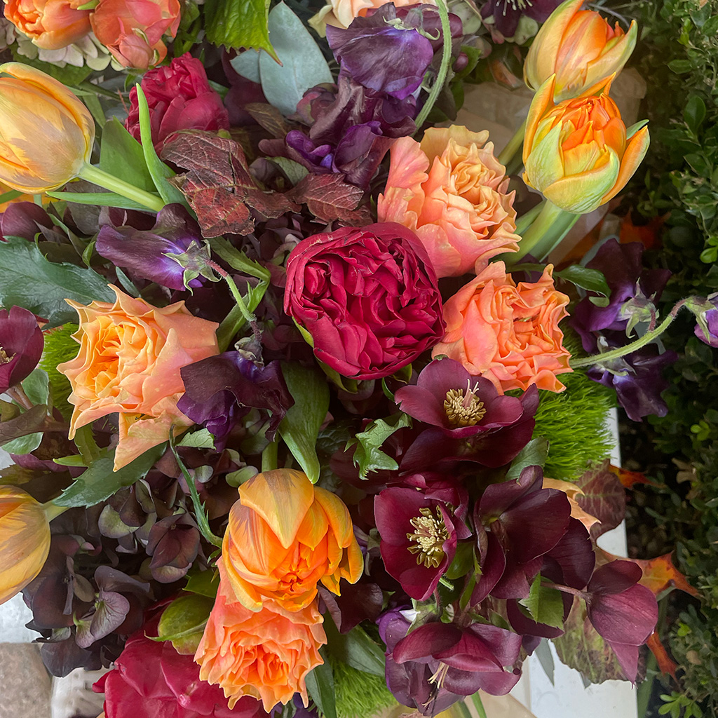 Moody, sculptural arrangement with depth by Wild Beauty Floral Design