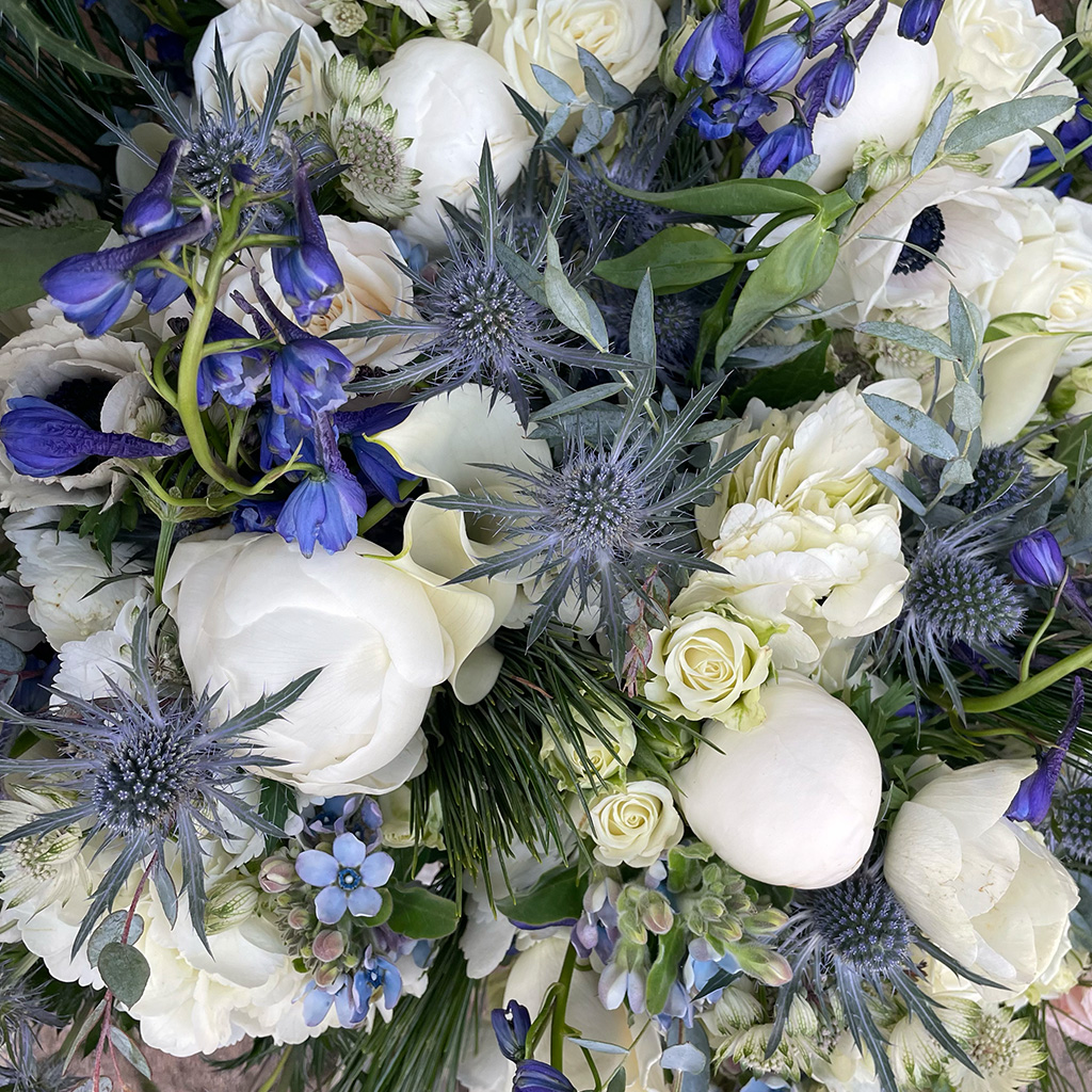 Expressive seasonal arrangement with layered color by Wild Beauty Floral Design